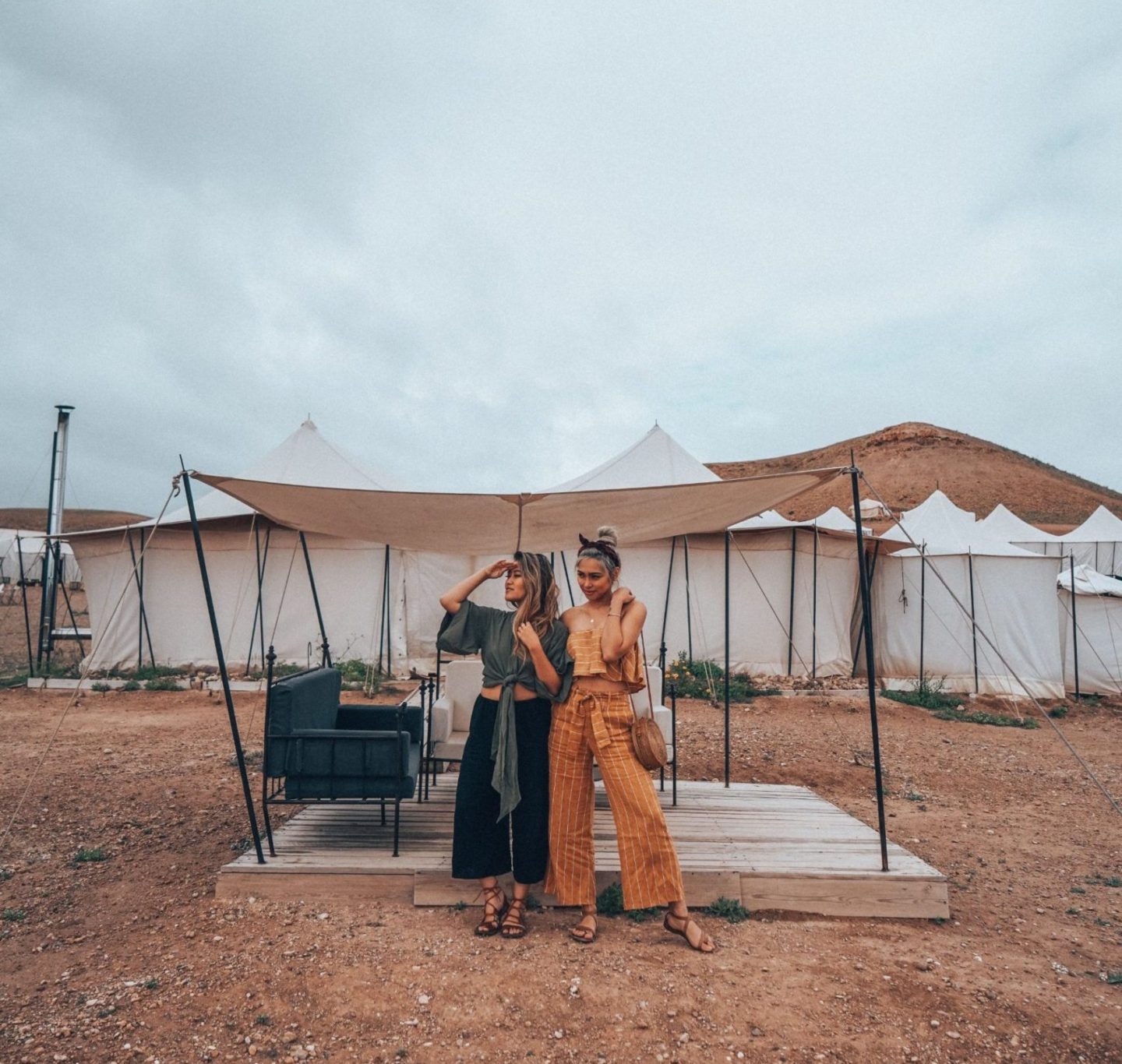 Two girls glamping at Scarabeo Camp